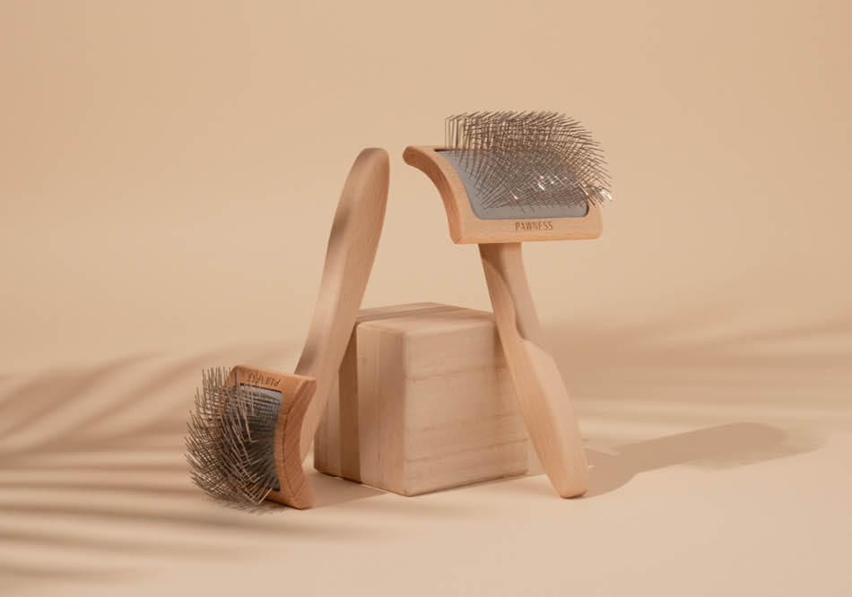 Twee Pawness Curved-slickerborstels voor honden